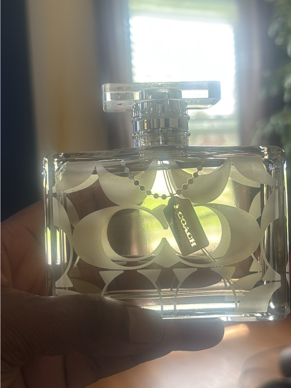 Coach Clear Perfume Bottle with Light Yellow Liquid and Silver Cap